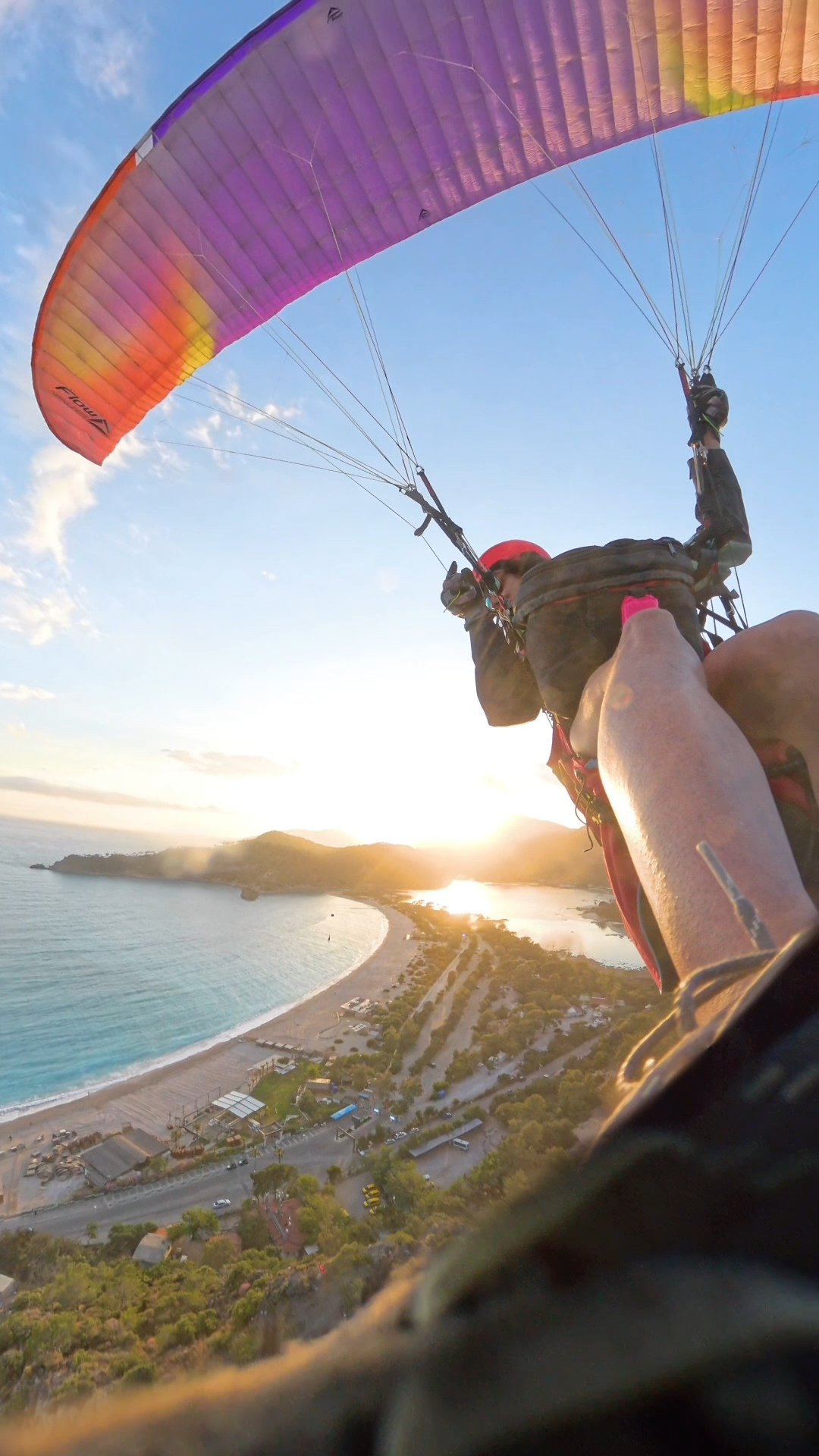 Kelly paragliding at sunset